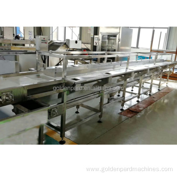 fish gutting machine in fish processing line